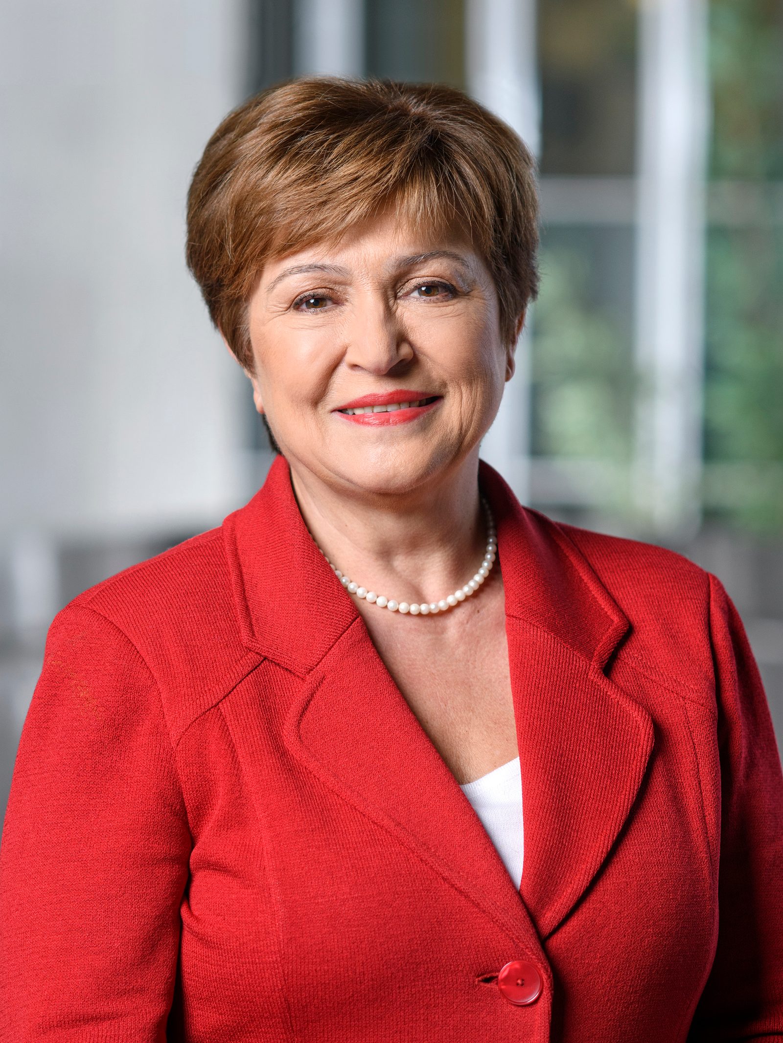 A studio portrait of Kristalina Georgieva in a dark jacket, facing the camera against a plain background.