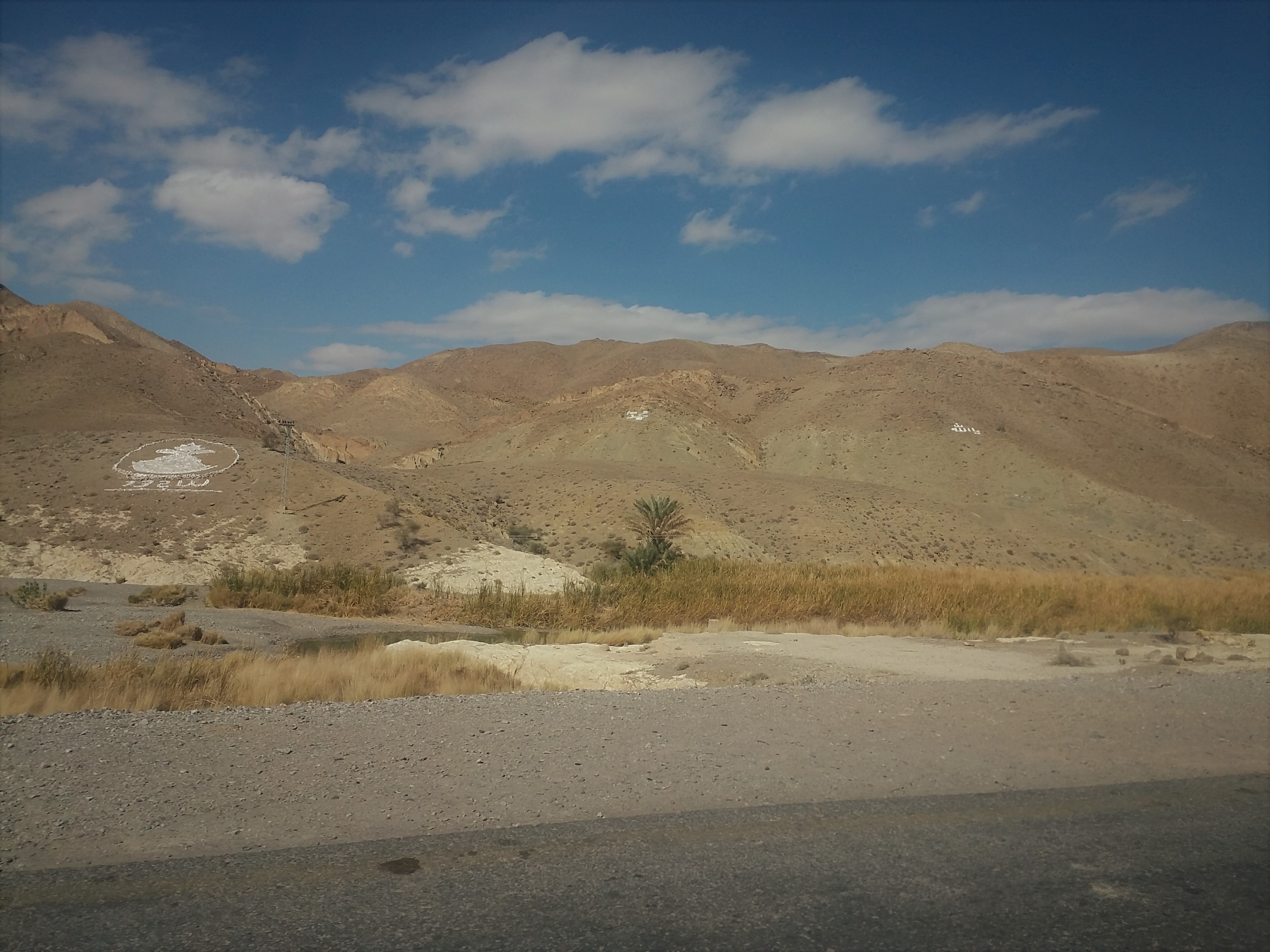 A road running through the dry mountains of Balochistan on the Quetta–Karachi N-25 highway