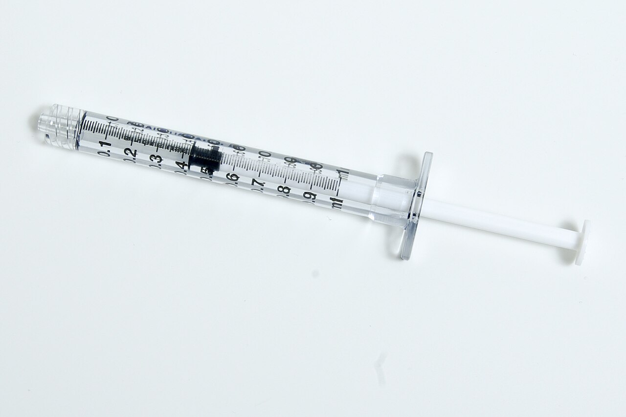 A one-millilitre disposable syringe.