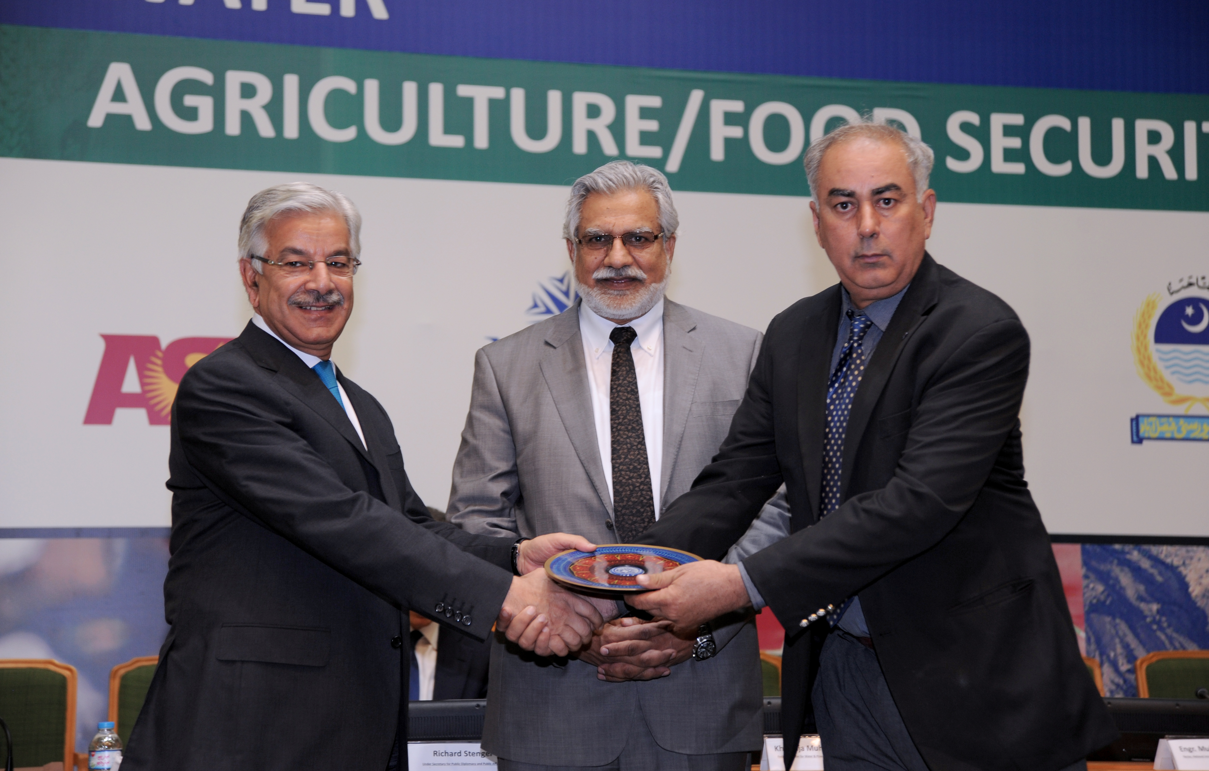 Khawaja Muhammad Asif, Pakistan's defence minister, speaking at a public event in a dark suit.