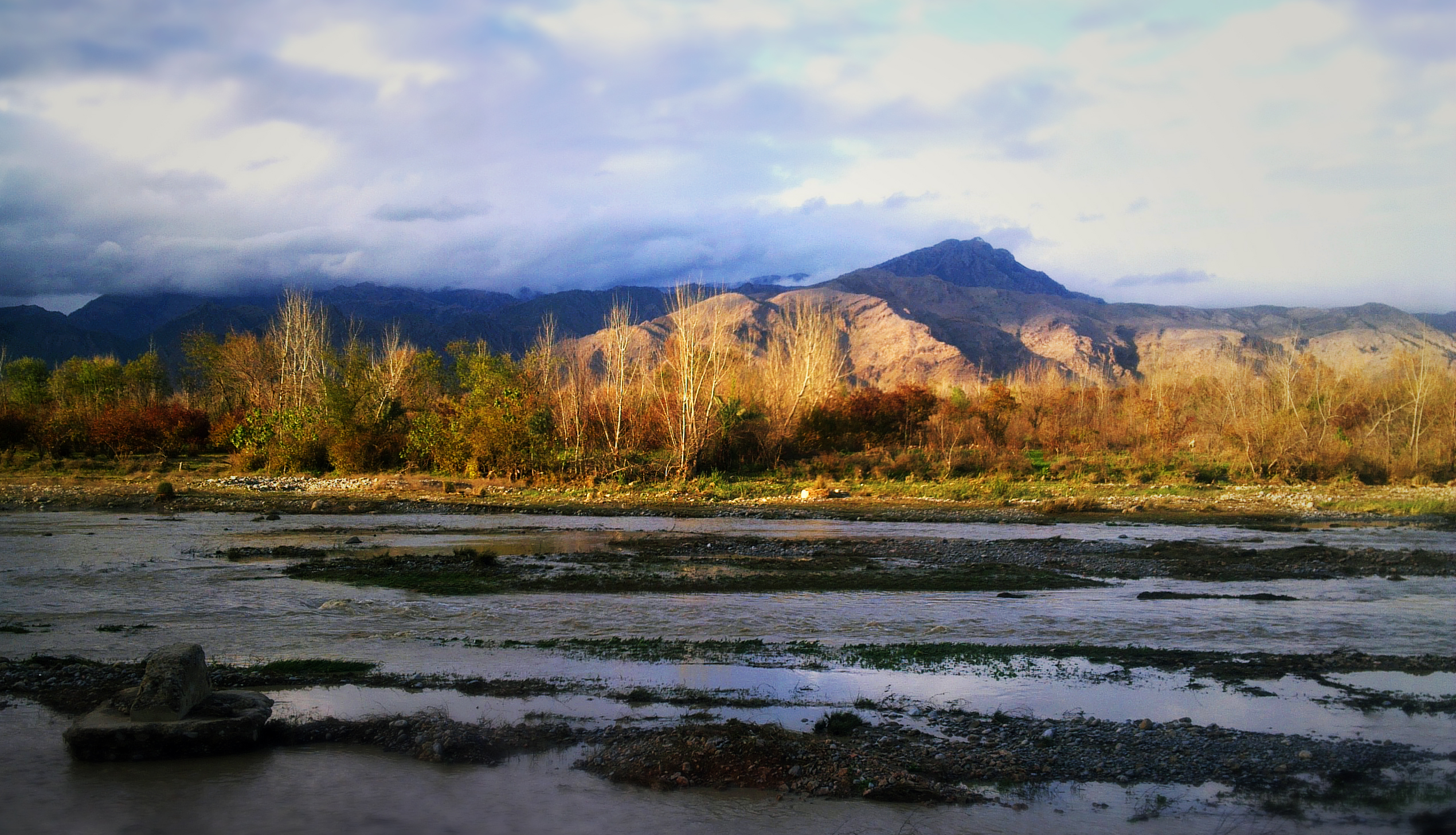 A winter view of a village and low hills in Kohat, Khyber Pakhtunkhwa