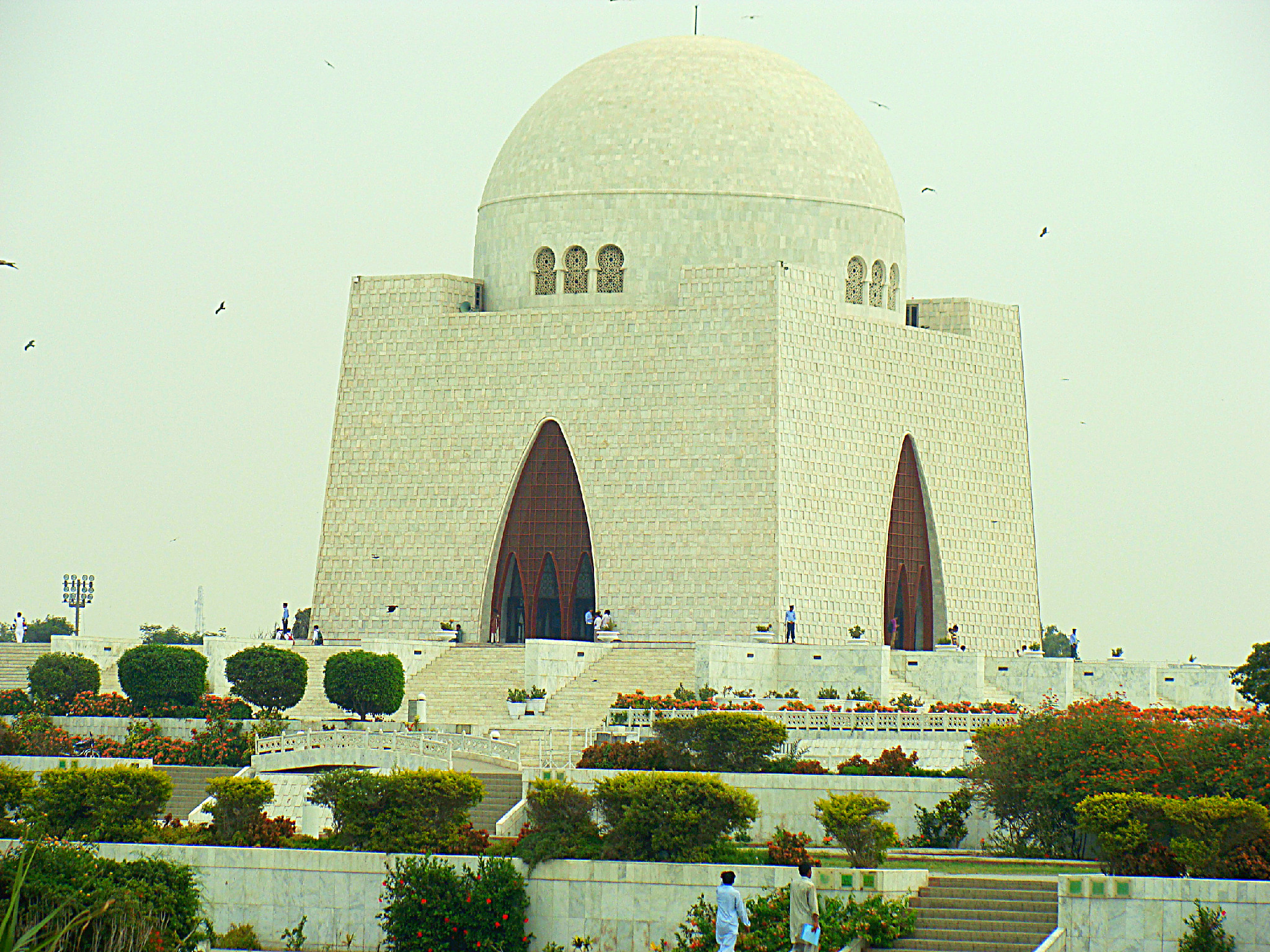 The domed white marble facade of Mazar-e-Quaid, the mausoleum of Muhammad Ali Jinnah, seen across its grounds in Karachi