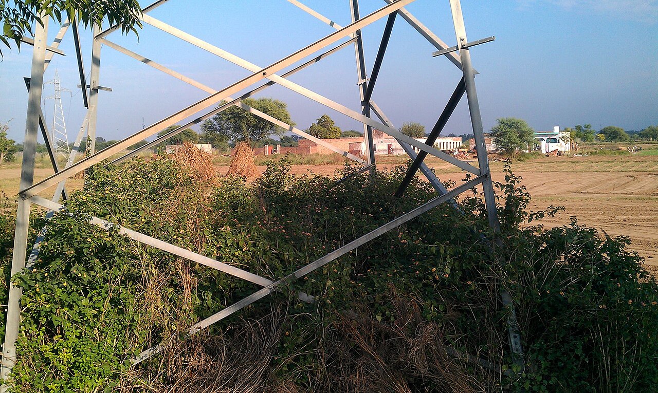 An electricity transmission tower near Thathi Mughlan in Punjab, Pakistan.