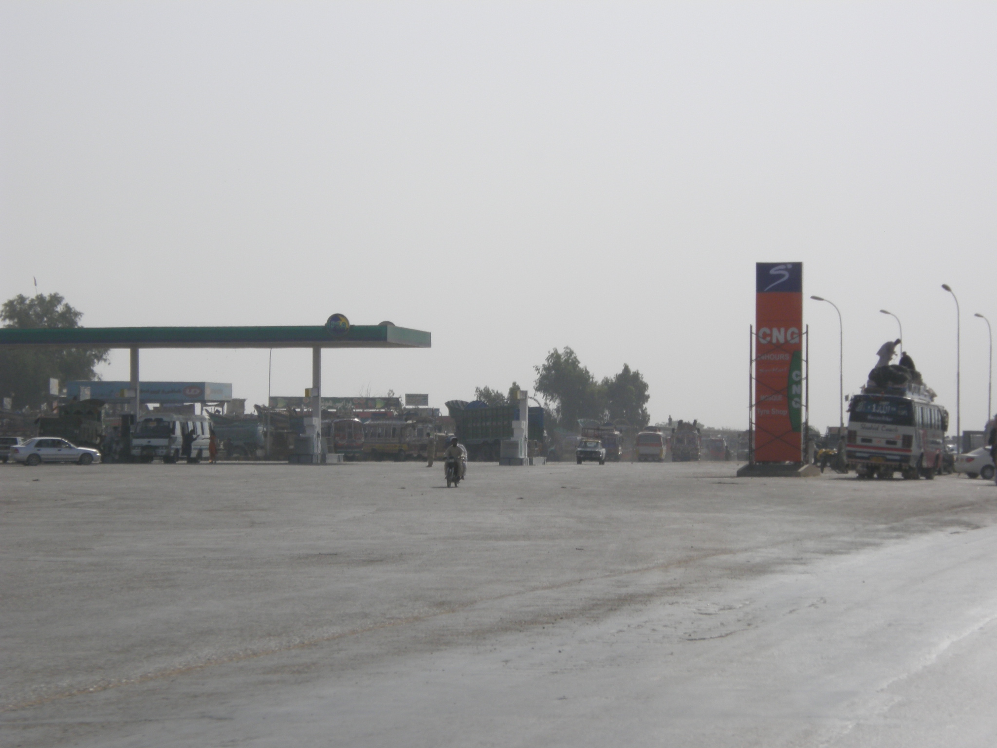 A Pakistan State Oil petrol station forecourt in Hyderabad, Sindh, with fuel pumps under a canopy.