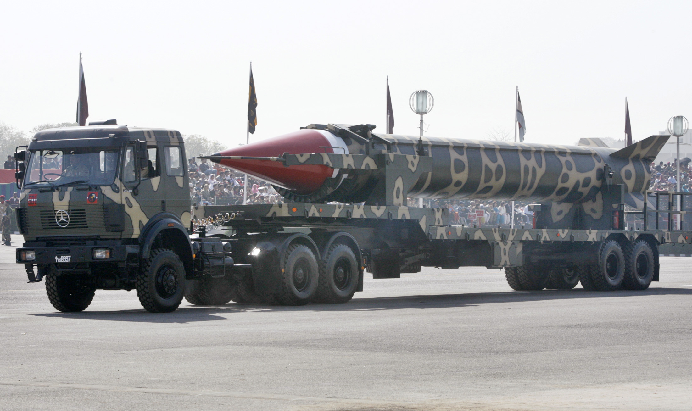 A nuclear-capable Ghauri missile mounted on a launcher is driven past during a Pakistan Day parade in Islamabad in 2007.