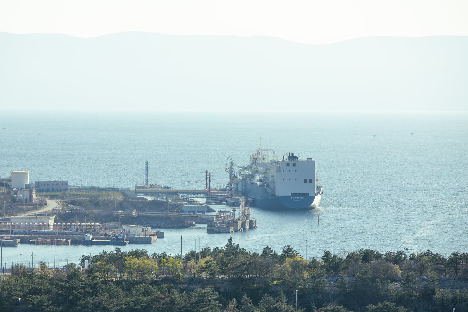 An oil tanker and a gas carrier at sea.