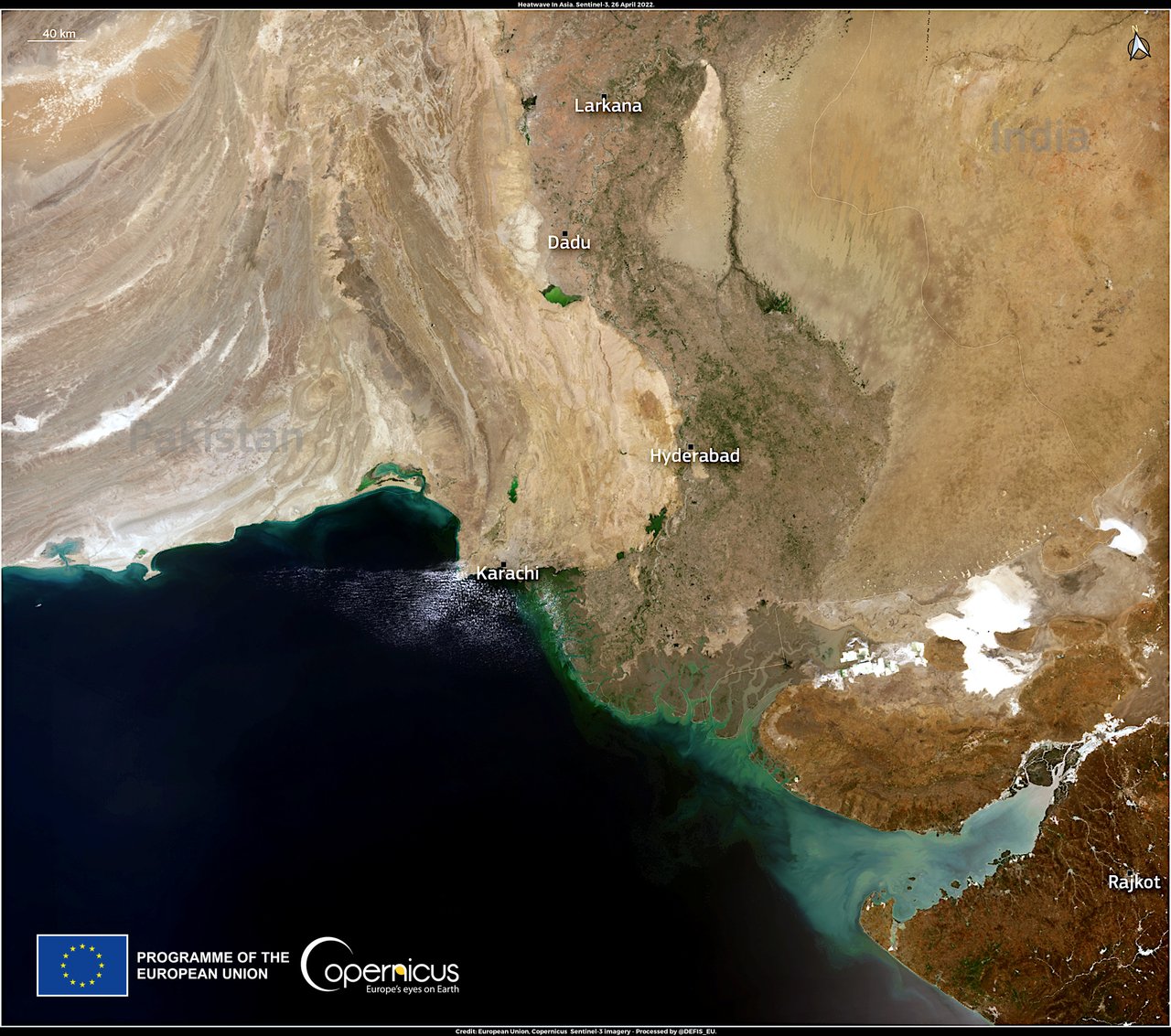 Satellite imagery showing a broad band of extreme heat across southern Asia.