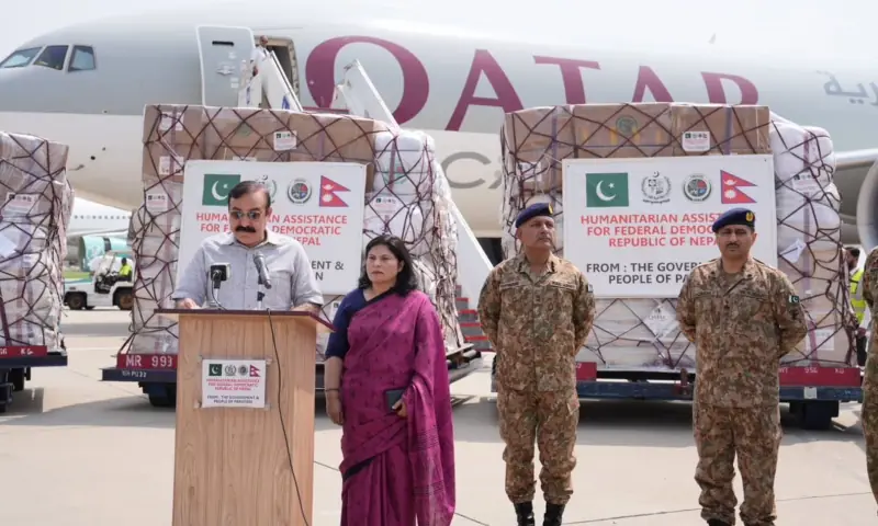 Officials attend the send-off of Pakistan's humanitarian aid shipment for Nepal at Islamabad airport