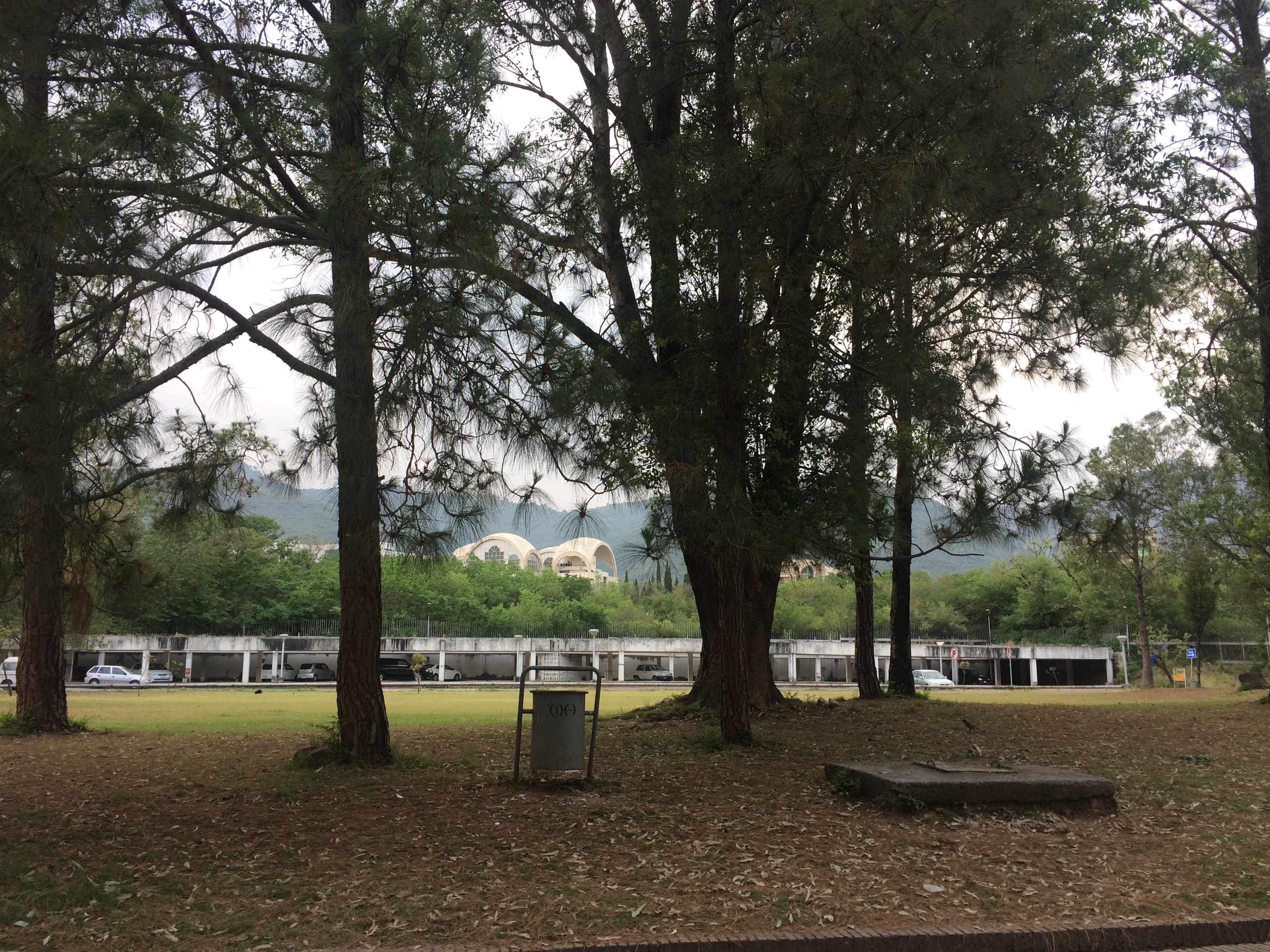 The Pakistan Secretariat complex in Islamabad, with its government blocks and lawns seen from across a road