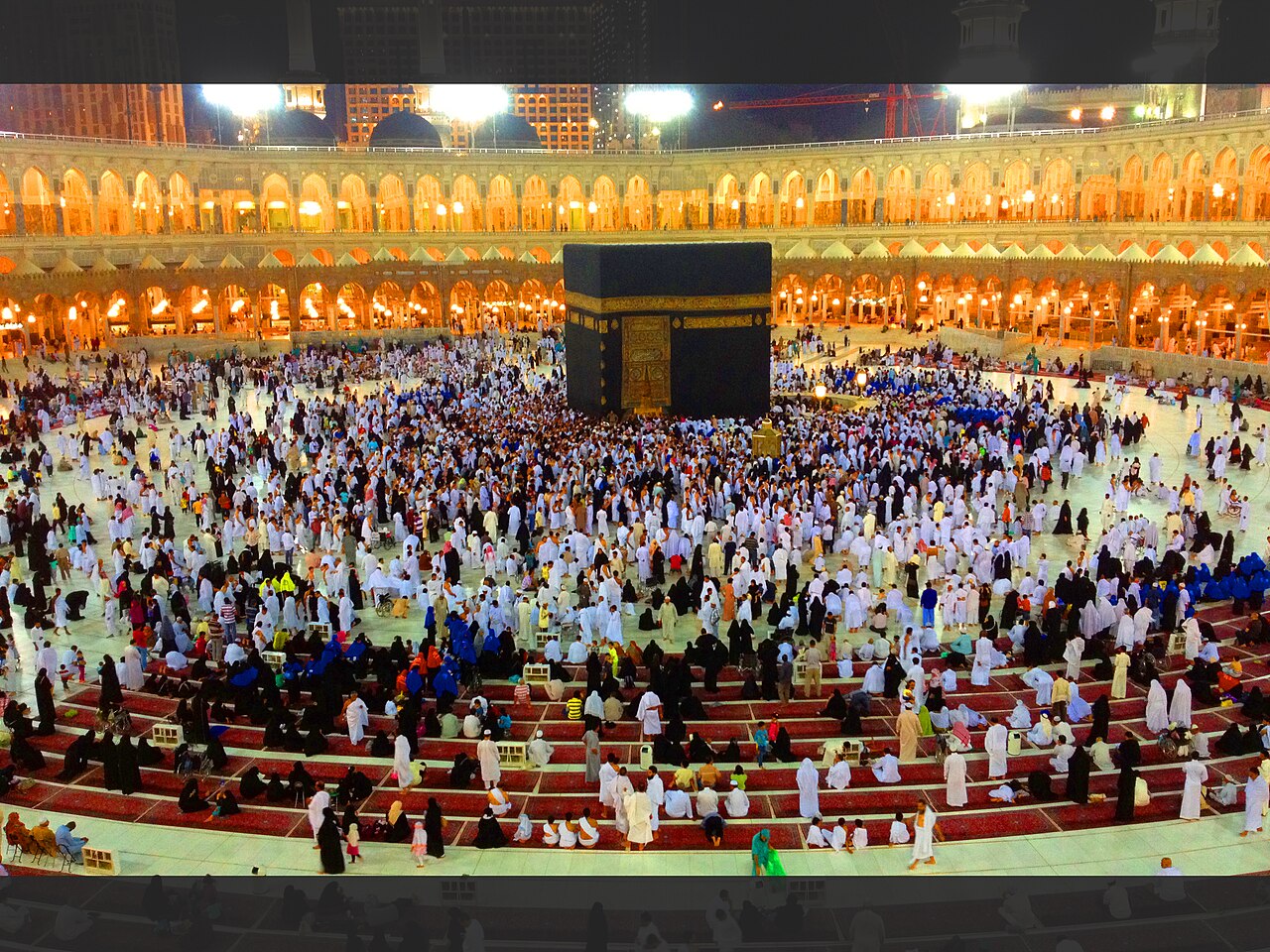 Pilgrims performing tawaf around the Kaaba at the Masjid al-Haram in Mecca, Saudi Arabia.