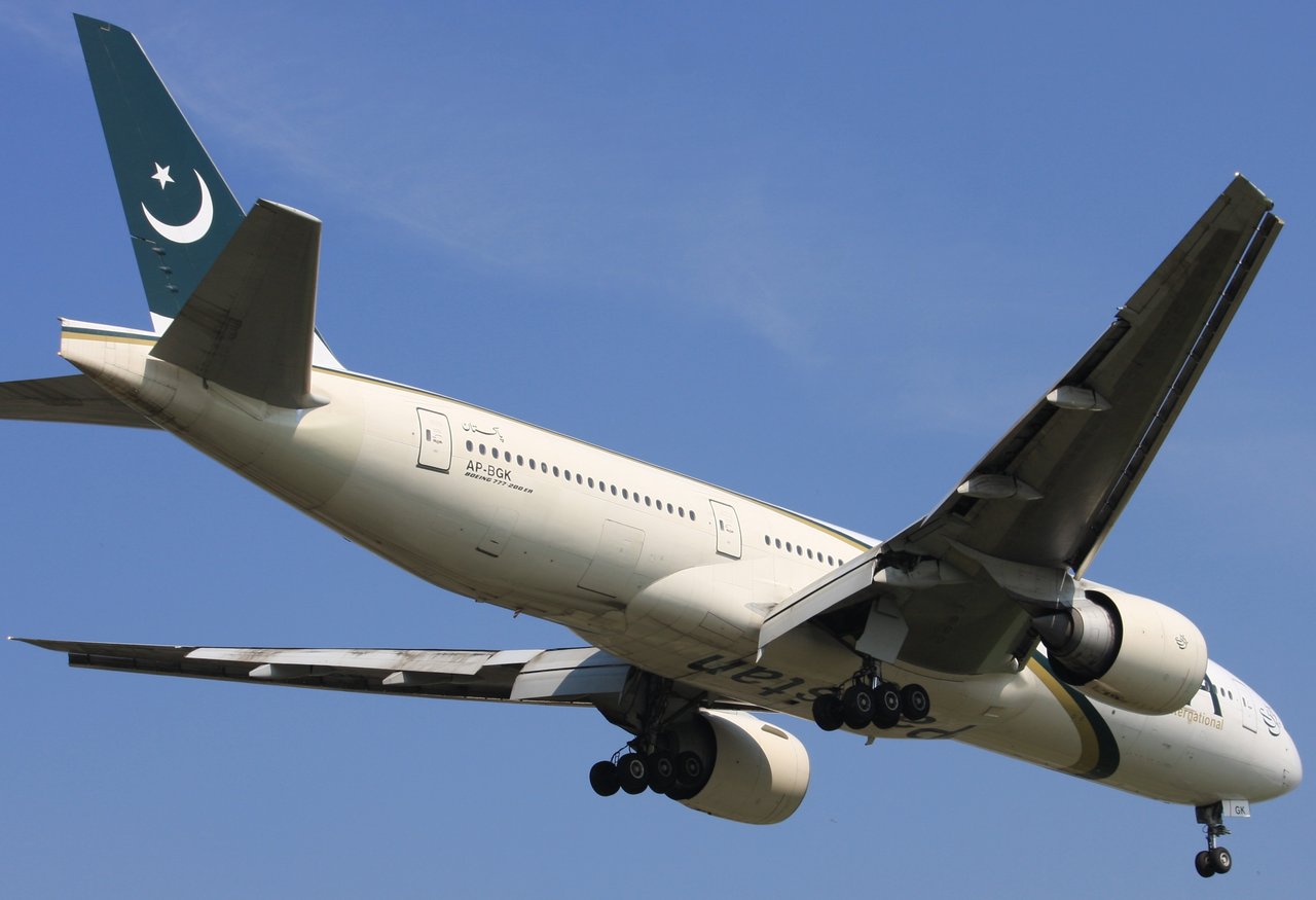 A Pakistan International Airlines Boeing 777-240ER with the registration AP-BGK taxiing at London Heathrow Airport