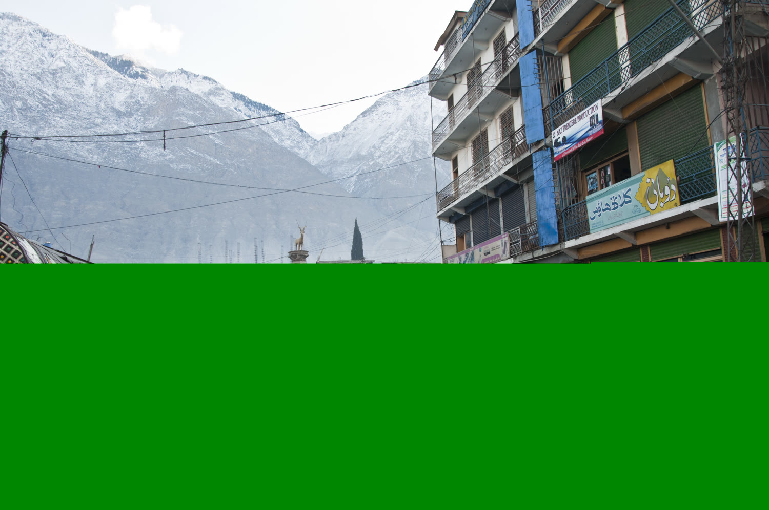 View over Gilgit city with mountains in the background.