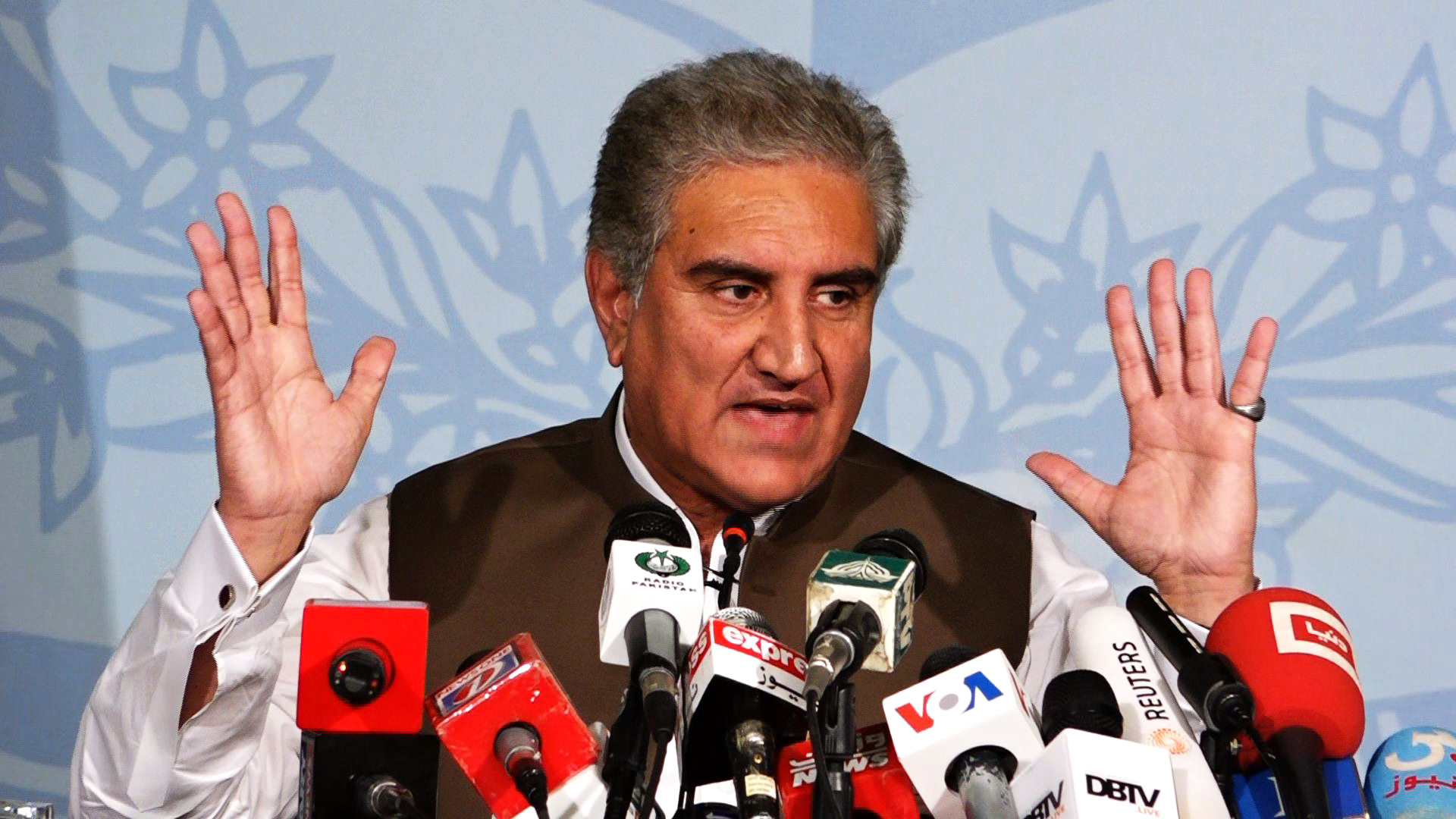 Shah Mahmood Qureshi speaking at a press conference.