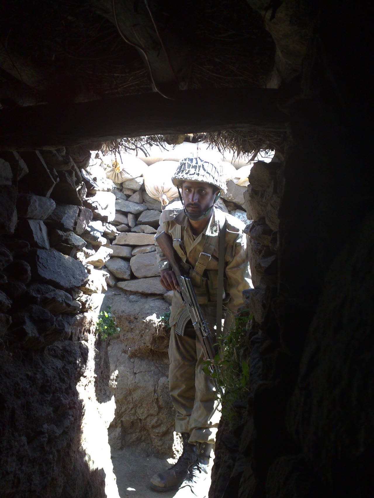A Pakistan Army soldier at a defensive position in the Swat valley.