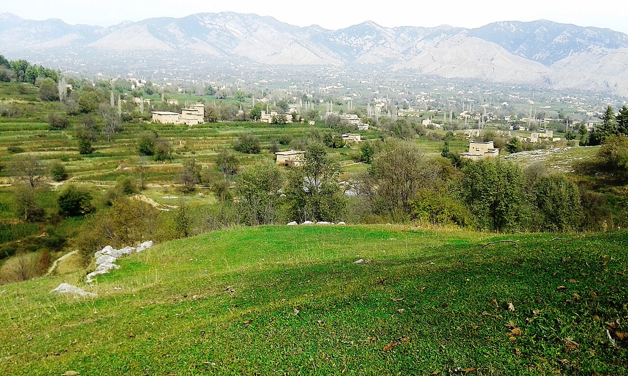 A view of the Malik Din Khell area of Tirah Valley in Khyber Pakhtunkhwa, showing scattered houses on a hillside