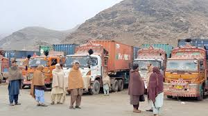 Cargo trucks and containers lined up at the Torkham border crossing between Pakistan and Afghanistan.