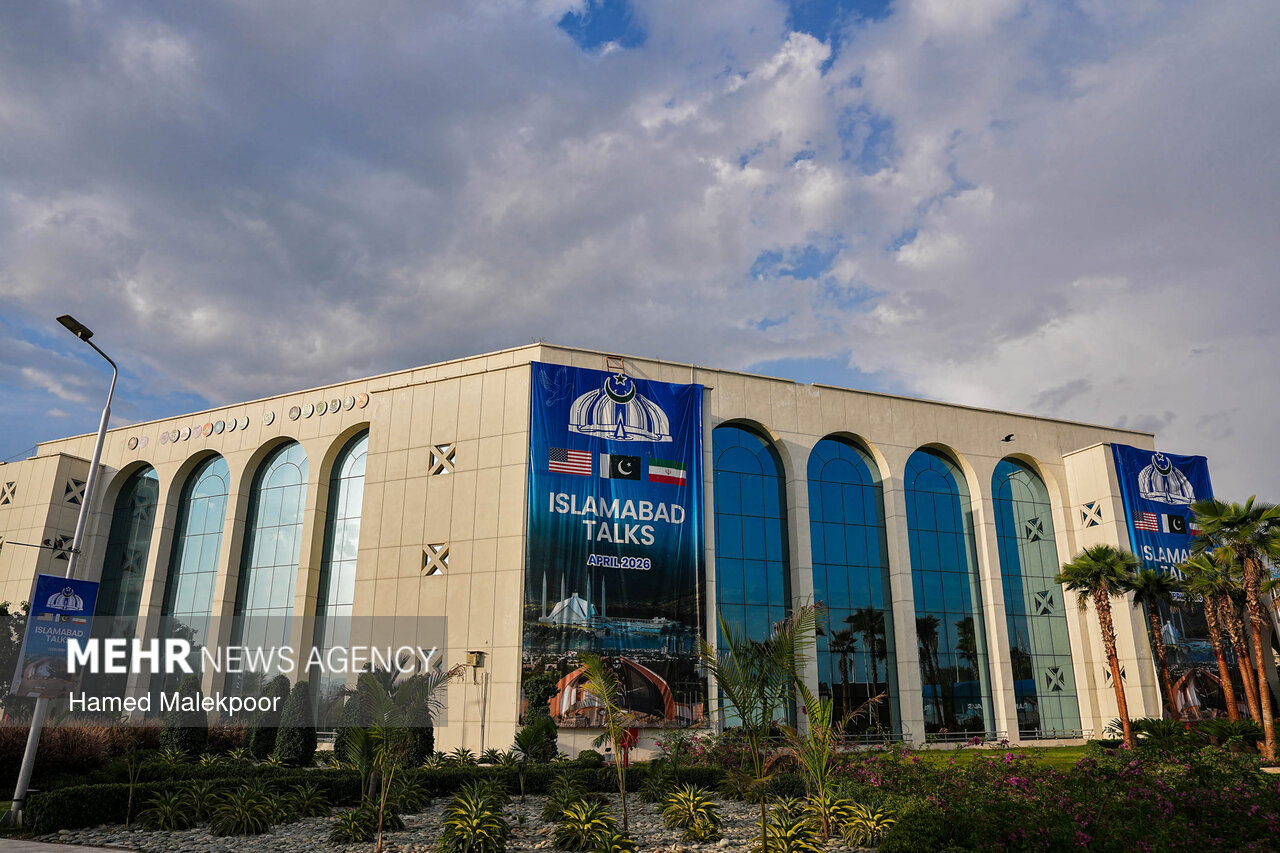 The Islamabad Talks banner showing the American, Pakistani and Iranian flags on a government building in Islamabad in April 2026.